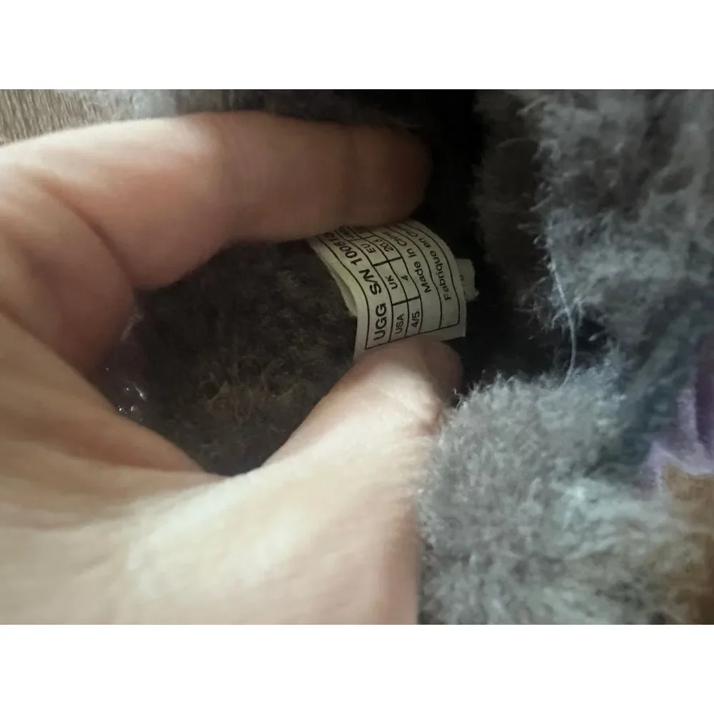 Black and purple Ugg boots gray fur lined 4/5‎ Cassie bow boot